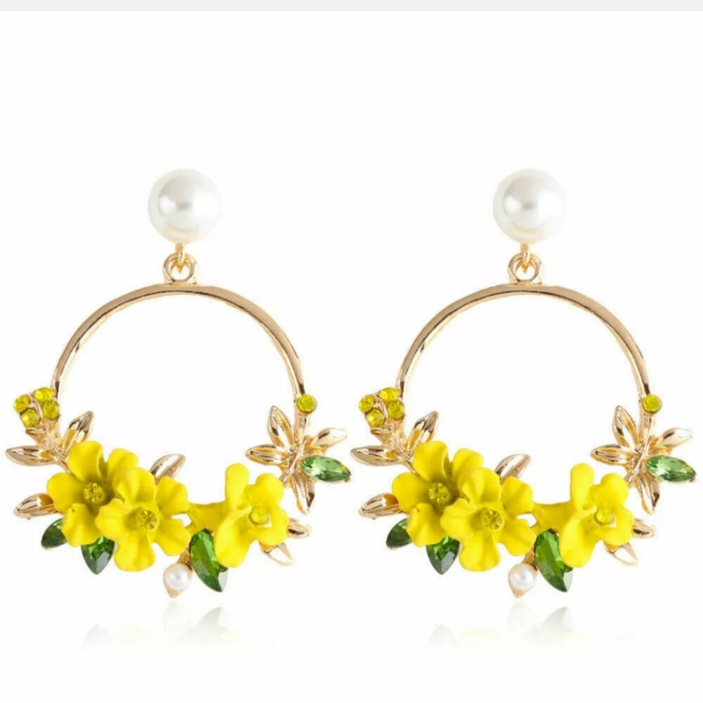Woman's earrings floral with crystals throughout